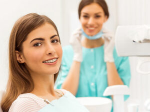 adult woman with practice at dentist
