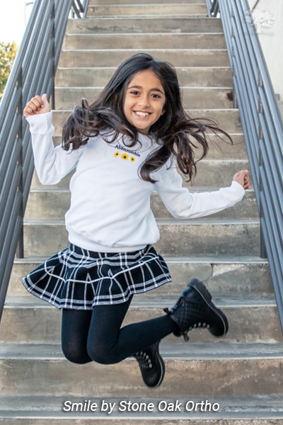 Girl smiling Stone Oak Orthodontics in San Antonio, TX