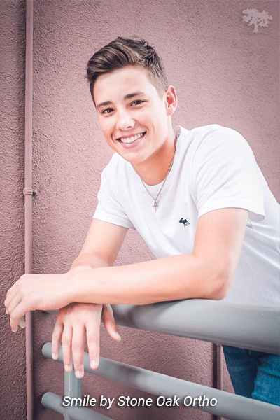 Teen smiling at Stone Oak Orthodontics in San Antonio, TX