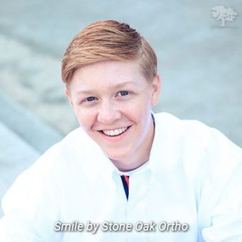 Teen smiling at Stone Oak Orthodontics in San Antonio, TX